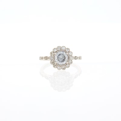 Lot 1129 - White Gold, Colored Diamond and Diamond Ring