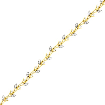 Lot 61 - Tiffany & Co. Gold, Platinum and Diamond 'Olive Leaf Vine' Bracelet