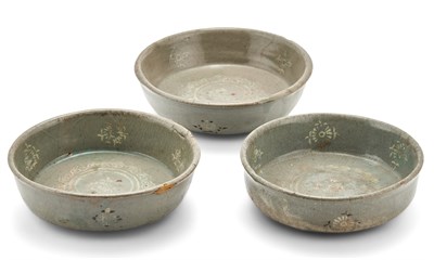 Lot 395 - Three Korean Slip-Inlaid Celadon Stoneware...