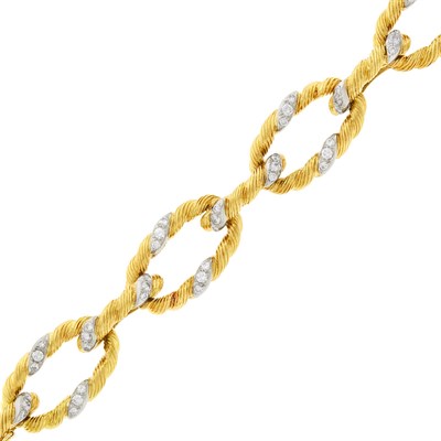 Lot 33 - Two-Color Gold and Diamond Link Bracelet