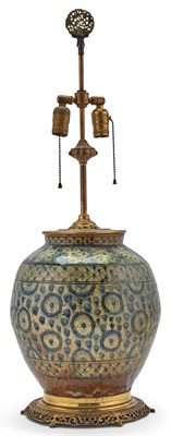 Lot 215 - A Persian Glazed Pottery Jar Mounted as a Lamp...