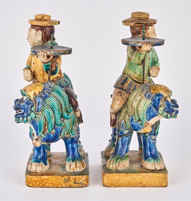 Lot 129 - A Pair of Chinese Tilework Figural Prickets...