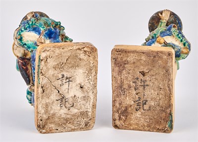 Lot 129 - A Pair of Chinese Tilework Figural Prickets...