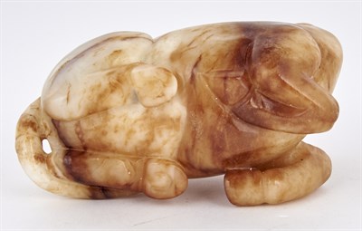 Lot 23 - A Chinese Mottled Jade Carving of a Horse Ming-...