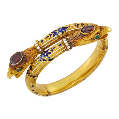 Lot 104 - Antique Gold, Seed Pearl, Garnet, Emerald and Enamel Eagle Head Crossover Bracelet