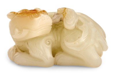 Lot 52 - A Chinese Carved White Jade Beast Finely...