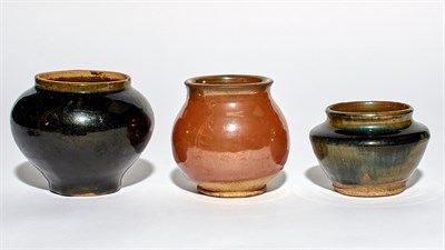 Lot 114 - A Group of Three Chinese Glazed Earthenware...