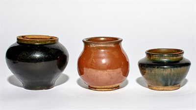 Lot 114 - A Group of Three Chinese Glazed Earthenware...