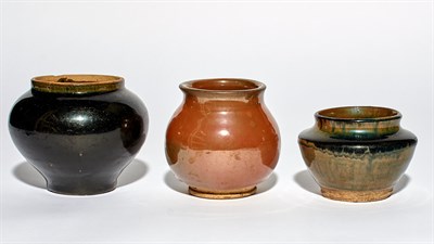 Lot 114 - A Group of Three Chinese Glazed Earthenware...