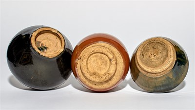 Lot 114 - A Group of Three Chinese Glazed Earthenware...