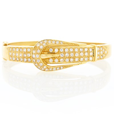 Lot 1018 - Gold and Diamond Buckle Bangle Bracelet