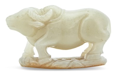Lot 34 - A Chinese White Jade Carving of a Buffalo Qing...