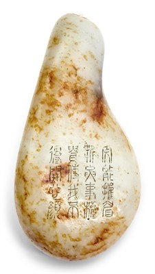 Lot 5 - A Chinese White and Russet Jade Snuff Bottle...