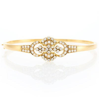 Lot 1086 - Gold and Diamond Bangle Bracelet