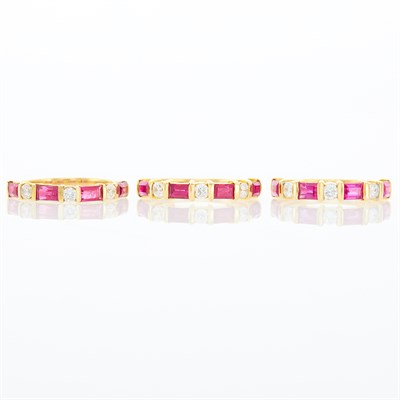 Lot 1158 - Three Gold, Ruby and Diamond Band Rings