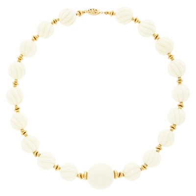 Lot 1083 - Gold and White Coral Bead Necklace
