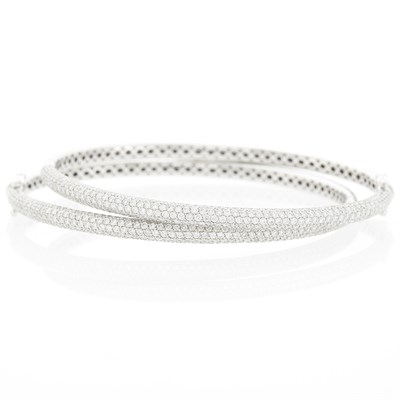Lot 1060 - Pair of White Gold and Diamond Bangle Bracelets