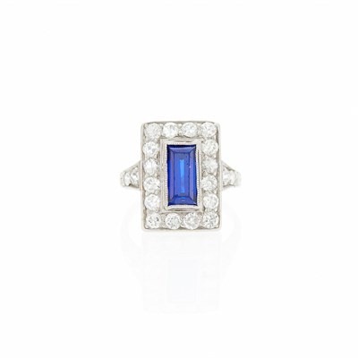 Lot 1053 - Platinum, Synthetic Sapphire and Diamond Ring