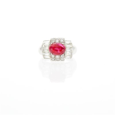 Lot 1048 - Platinum, White Gold, Cabochon Ruby and Diamond Ring