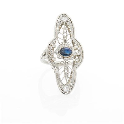 Lot 1178 - Platinum, Gold, Cabochon Sapphire and Diamond Ring