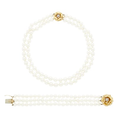 Lot 1207 - Double Strand Cultured Pearl Necklace and Triple Strand Bracelet with Gold and Diamond Clasps