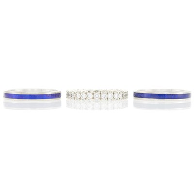 Lot 1267 - Three White Gold, Blue Enamel and Diamond Band Rings