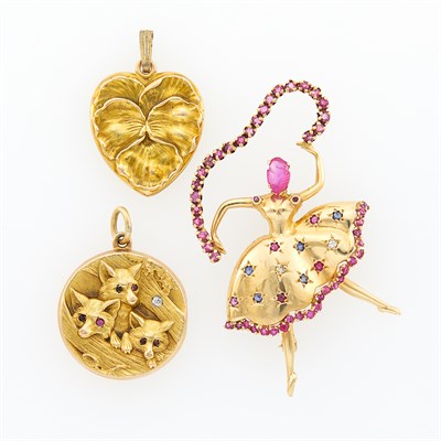 Lot 1261 - Gold, Carved Ruby, Diamond and Get-Set Ballerina Brooch and Two Low Karat Gold Locket Pendants