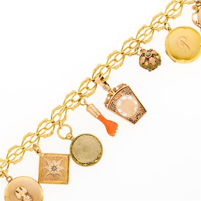 Lot 1198 - Gold and Gold-Filled Charm Bracelet