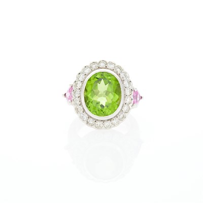 Lot 1067 - White Gold, Peridot, Pink Sapphire and Diamond Ring