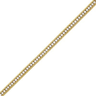 Lot 89 - Attributed to Oscar Heyman & Brothers Gold, Platinum and Diamond Bracelet