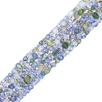 Lot 114 - Wide White Gold and Multicolored Sapphire Bracelet