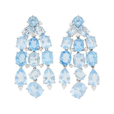 Lot 123 - Pair of White Gold, Blue Topaz and Diamond Pendant-Earclips