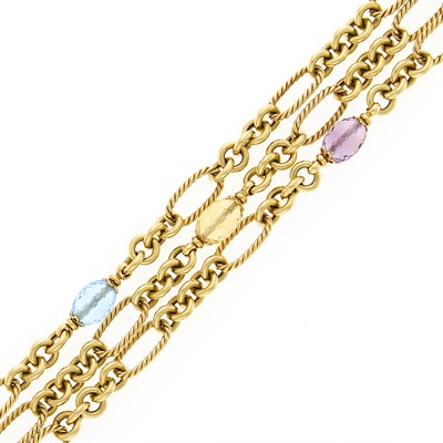 Lot 1113 - Triple Strand Gold, Blue Topaz, Citrine and Amethyst Bead Chain Bracelet