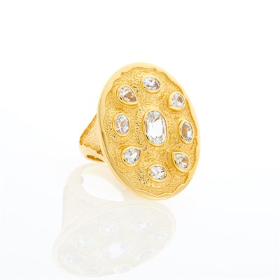 Lot 1219 - Gold and White Sapphire Ring