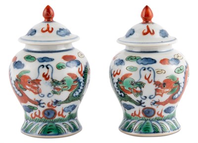 Lot 155 - A Miniature Pair of Chinese Wucai Porcelain Jars and Covers