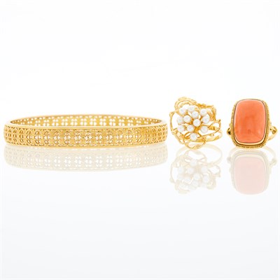 Lot 1121 - Pierced Gold Bangle Bracelet, Coral Ring and Cultured Pearl Flower Ring