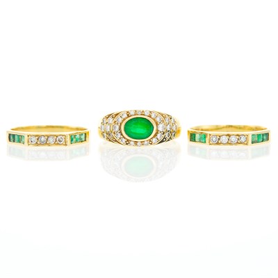 Lot 1244 - Gold, Emerald and Diamond Ring and Two Band Rings