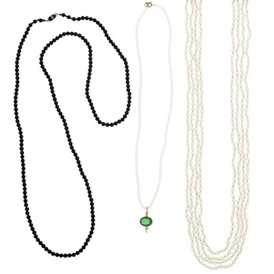 Lot 1167 - Three Cultured and Freshwater Pearl, Black Onyx, Enamel and Diamond Necklaces