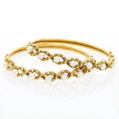 Lot 1124 - Pair of Gold and Cultured Pearl Bangle Bracelets