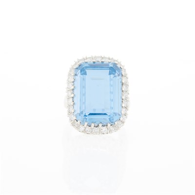 Lot 1197 - White Gold, Blue Topaz and Diamond Ring