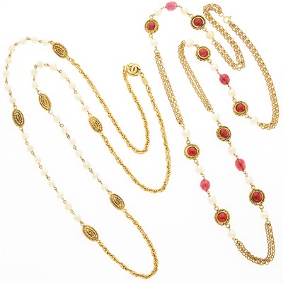 Lot 1070 - Long Gilt-Metal, Simulated Pearl and Glass Bead Chain Necklace and Chanel Gilt Metal, Imitation Pearl and Glass Chain Necklace, France