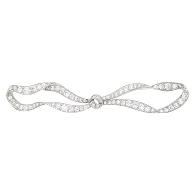 Lot 211 - Belle Époque Platinum and Diamond Bow Brooch