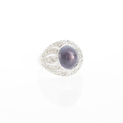 Lot 1180 - White Gold, Purple-Gray Star Sapphire and Diamond Ring