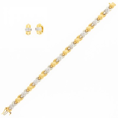Lot 2320 - Two-Color Gold and Diamond Bracelet and Pair of Huggie Earrings