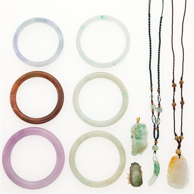 Lot 2233 - Six Multicolored Jade Bangle Bracelets, Ring and Three Pendants