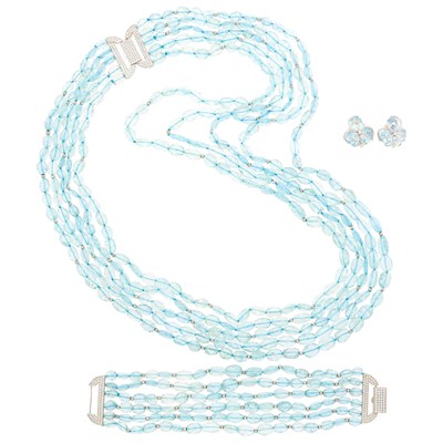 Lot 2206 - Multistrand Blue Topaz Bead, Silver and Simulated Diamond Necklace and Bracelet and Pair of White Gold, Blue Topaz and Diamond Earclips