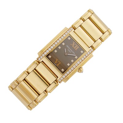 Lot 20 - Patek Philippe Gold and Diamond 'Twenty-4' Wristwatch, Ref. 4910/11
