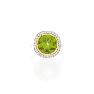 Lot 2260 - Platinum, Gold, Peridot and Diamond Ring