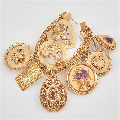 Lot 60 - Gold Charm Bracelet with 10 gold, bead and...