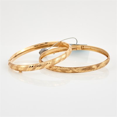Lot 372 - Two Gold Rigid Bracelets, 14K 4 dwt. and 10K 2...